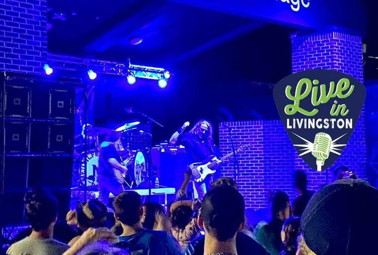 band playing under blacklight