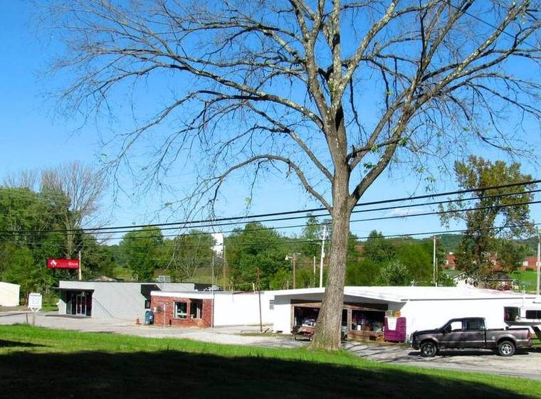 A small post office building and an adjoining business along Rickman Road in the Rickman community.