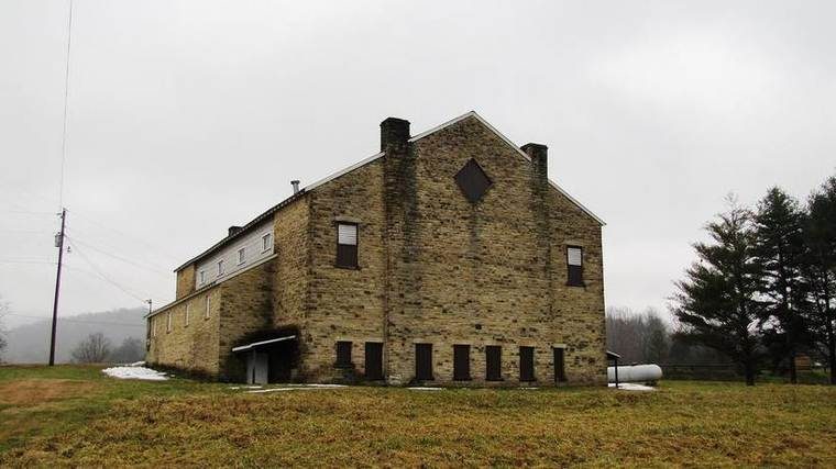 A native-limestone building built by the Works Progress Administration in 1939, which once housed the Alpine Institute's gymnasium.