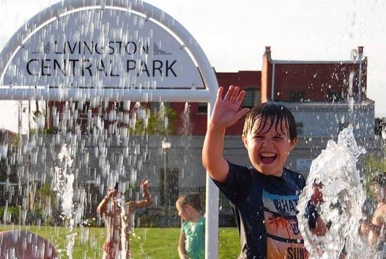 child splashing in water