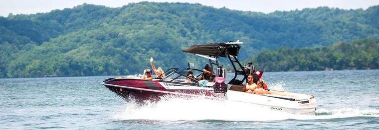 people on a speed boat