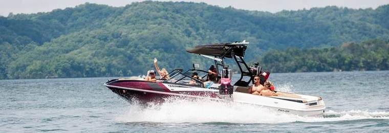 group enjoying boating on the lake